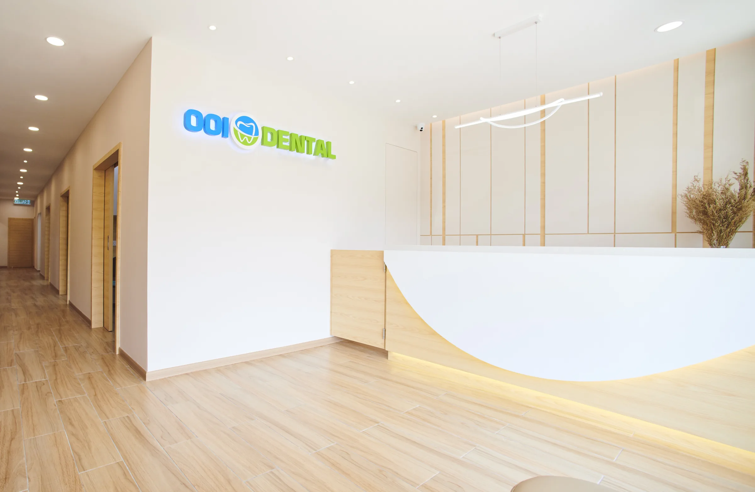 The reception and corridor at an Ooi Dental clinic in Melaka