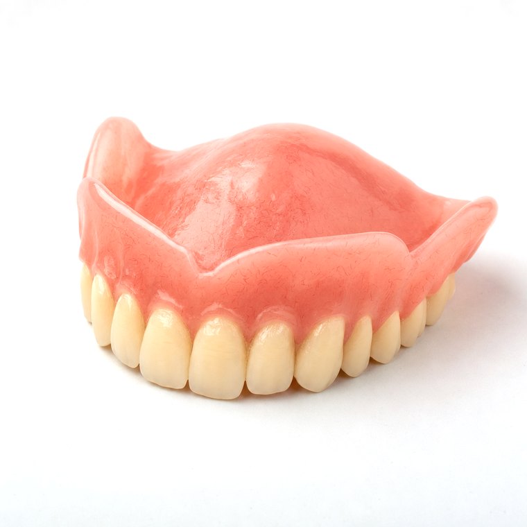 A complete upper acrylic denture